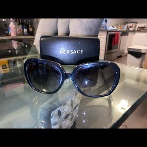 Pre-owned authentic Black Glasses Versace